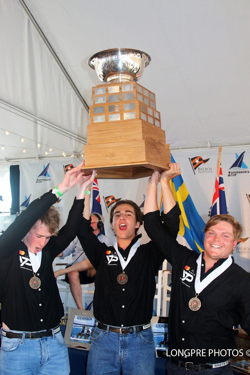 Winners of the 55th Governor's Cup Jordan Stevenson, Mitch Jackson, and George Angus (NZL) hoisting the Governor's Cup trophy photo copyright Longpre Photos taken at Balboa Yacht Club and featuring the Match Racing class