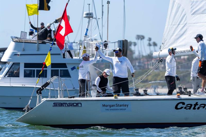Monnin celebrates his third place podium finish in the 59th Congressional Cup - photo © Ian Roman / WMRT