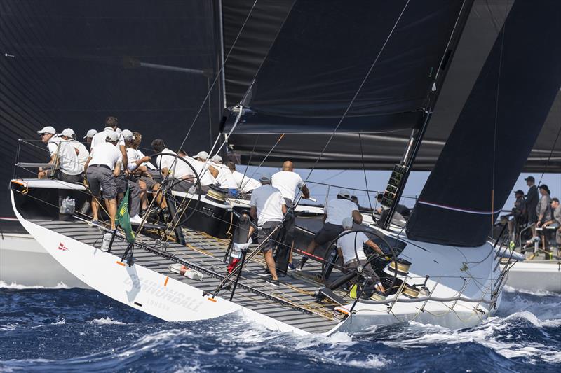 Cannonball's winning move, ducking transoms at the start on day 2 of the Maxi Yacht Rolex Cup photo copyright Studio Borlenghi / International Maxi Association taken at Yacht Club Costa Smeralda and featuring the Maxi 72 Class class