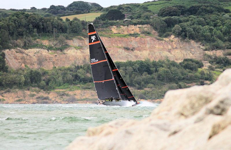 The 2023 Round the Island Race fleet pass through the Hurst narrows photo copyright Sam Jardine taken at Island Sailing Club, Cowes and featuring the Maxi 72 Class class