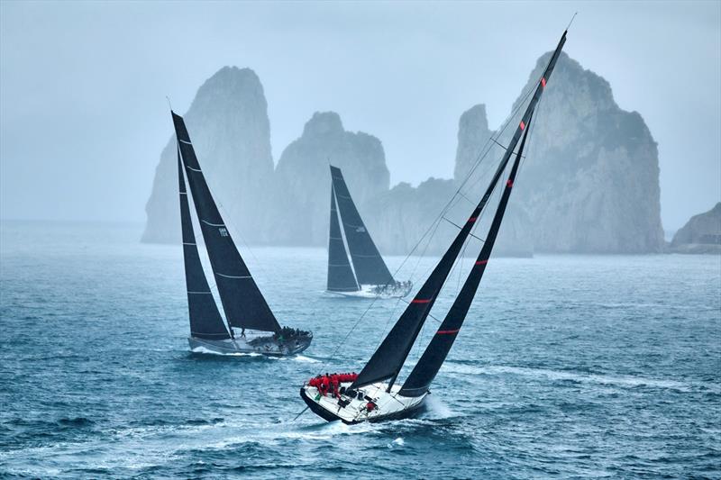 The Maxi 72s and the ClubSwan 80 My Song approach the Faraglioni rocks while circumnavigating Capri during the 2023 IMA Maxi Europeans photo copyright IMA / Studio Borlenghi taken at Circolo del Remo e della Vela Italia and featuring the Maxi 72 Class class