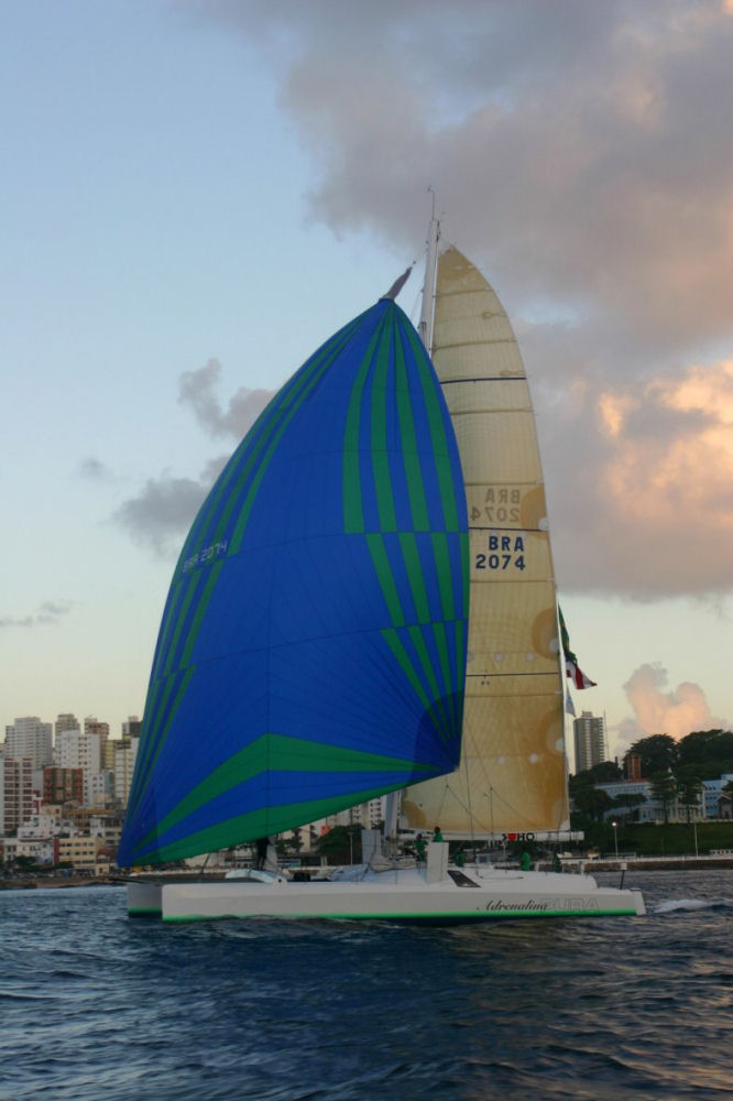 The Brazilian catamaran Adrenalina Pura arrives in Salvador after shattering the Heineken Cape to Bahia Race record photo copyright Peridot Communications taken at  and featuring the Maxi Cat class