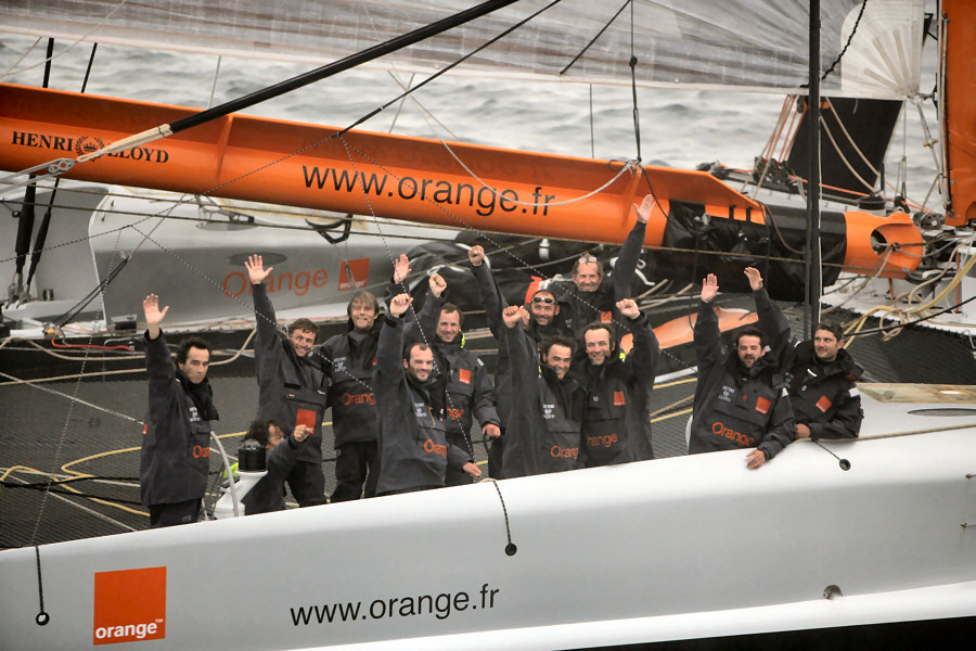 Orange II crosses the finishing line at The Lizard to smash the Atlantic record photo copyright Gilles Martin-Raget taken at  and featuring the Maxi Cat class