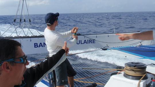 The third small bottle of Champagne Mumm is uncorked as Maxi Banque Populaire V set a new equator to equator record photo copyright BPCE taken at  and featuring the Maxi Cat class