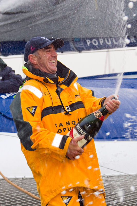Lock Peyron celebrates setting a new Jules Verne Trophy reference time on Banque Populaire V photo copyright Benoit Stichelbaut / BPCE taken at  and featuring the Maxi Cat class