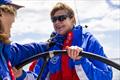 © 2025 Richard Schultz. 50 Eggs Films Olympian Leslie Egnot at the wheel, on location in Oyster Bay © 2025 Richard Schultz. 50 Eggs Films