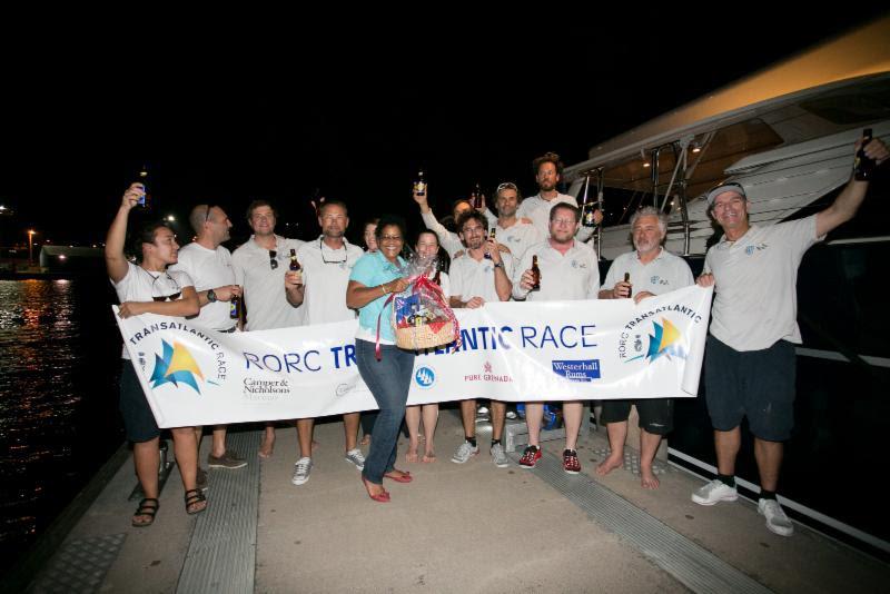 Celebrating on the dock after completing the RORC Transatlantic Race, Anatoli Karatchinski's Baltic 112, Path - photo © RORC / Arthur Daniel