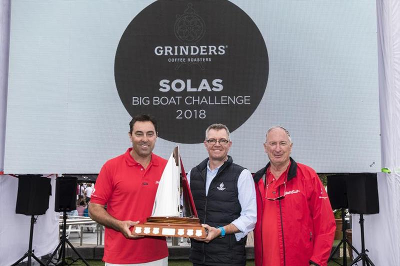 Wild Oats XI skipper Mark Richards, Grinders Coffee Head of Sales Jonathan Kerley and Sandy Oatley pose with the Big Boat Challenge Line Honours trophy photo copyright Andrea Francolini taken at Cruising Yacht Club of Australia and featuring the Maxi class
