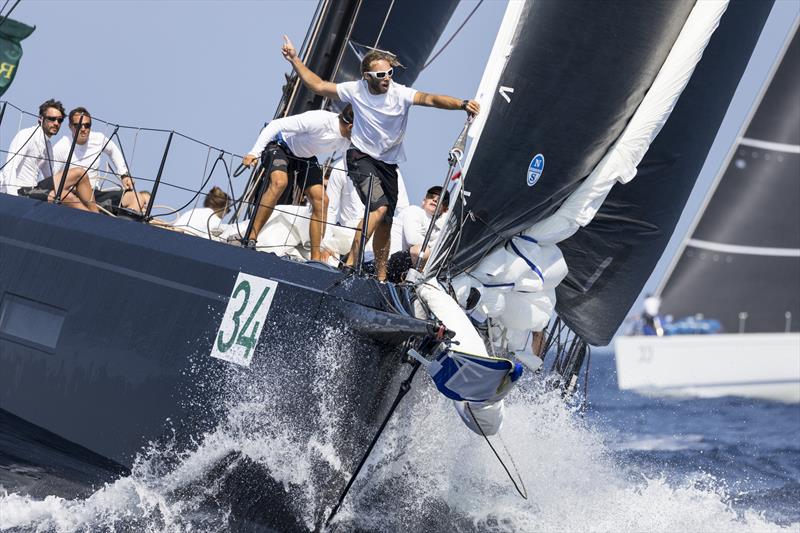 Foredeck action on Romanian Catalin Trandafir's brand new Grand Soleil 80 Essentia on day 2 of the Maxi Yacht Rolex Cup photo copyright Studio Borlenghi / International Maxi Association taken at Yacht Club Costa Smeralda and featuring the Maxi class