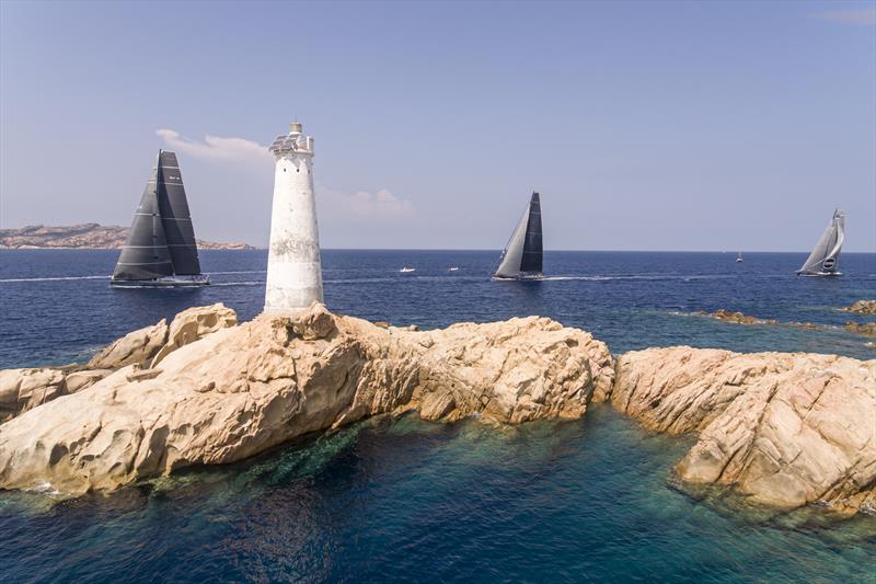 Leopard leads Highland Fling XI around Monaci on day 2 of the Maxi Yacht Rolex Cup photo copyright Studio Borlenghi / International Maxi Association taken at Yacht Club Costa Smeralda and featuring the Maxi class