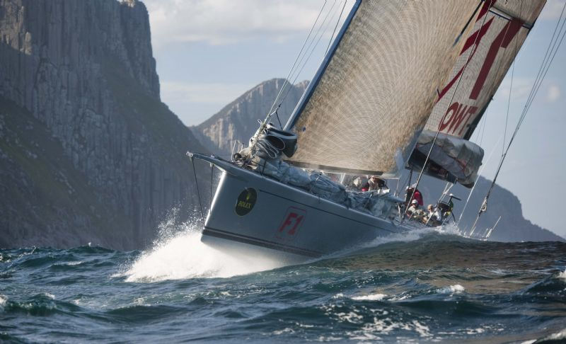 Neville Crichton's Alfa Romeo passes Tasman Island during the 65th Rolex Sydney Hobart photo copyright Kurt Arrigo / Rolex taken at  and featuring the Maxi class