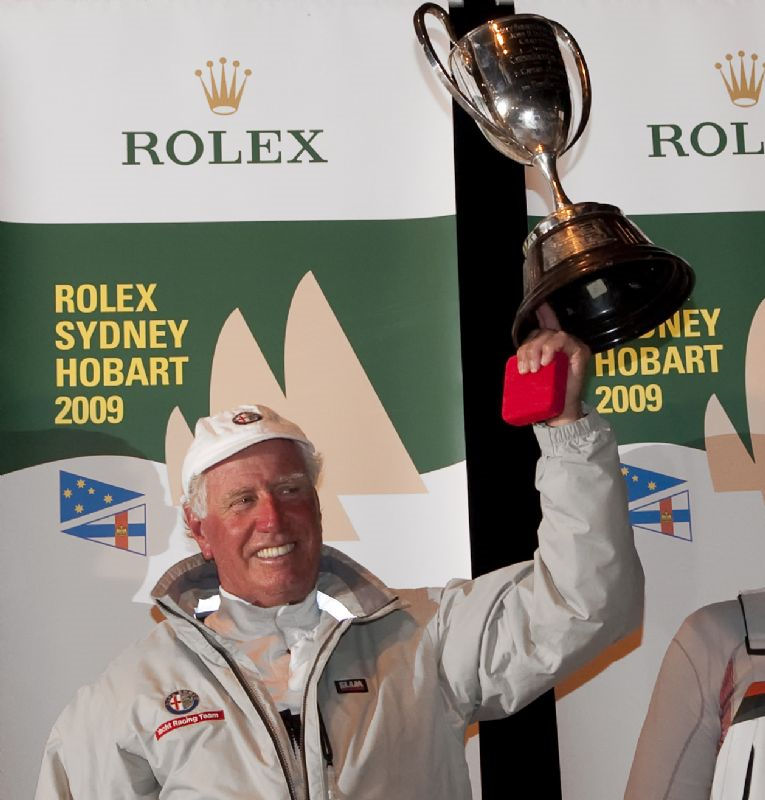 Neville Crichton receives the JH Illingworth trophy for line honours in the 65th Rolex Sydney Hobart Yacht Race photo copyright Kurt Arrigo / Rolex taken at  and featuring the Maxi class