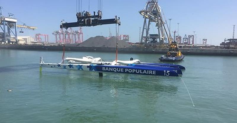 The Ultime class Banque Populaire IX is righted in Casablanca after being towed 130nm after her capsize photo copyright Banque Populaire IX taken at  and featuring the Maxi class