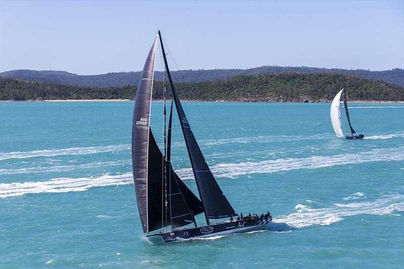 Peter Harburg's record-breaking supermaxi, Black Jack, blasts away from the start line at Hamilton Island Race Week 2017 photo copyright Andrea Francolini taken at Hamilton Island Yacht Club and featuring the Maxi class