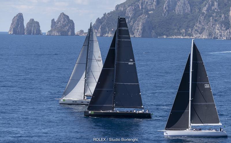 Conditions turned light then died as the Maxis ventured out beyond - here showing the famous Faraglioni rocks in the distance - 2018 Rolex Capri Sailing Week - photo © Carlo Borlenghi