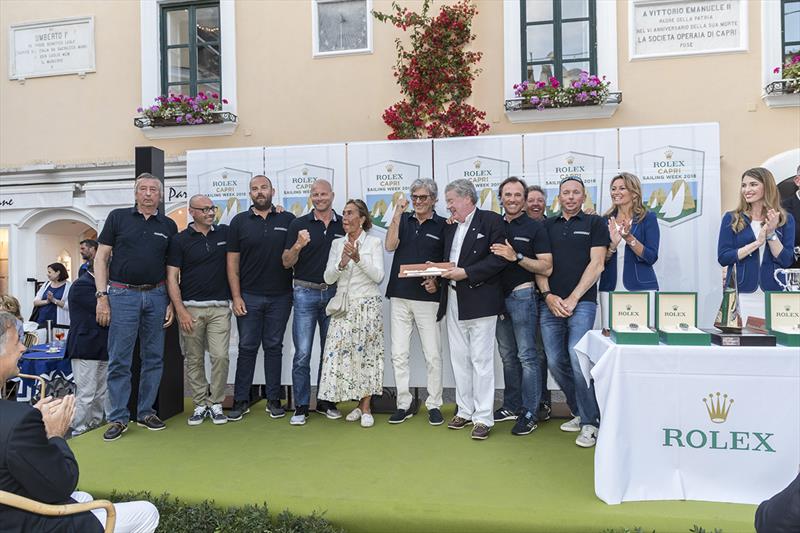 Pepe Cannonball's Dario Ferrari is presented with his prize by International Maxi Association Secretary General Andrew McIrvine  - Rolex Capri Sailing Week 2018 - photo © Gianfranco Forza