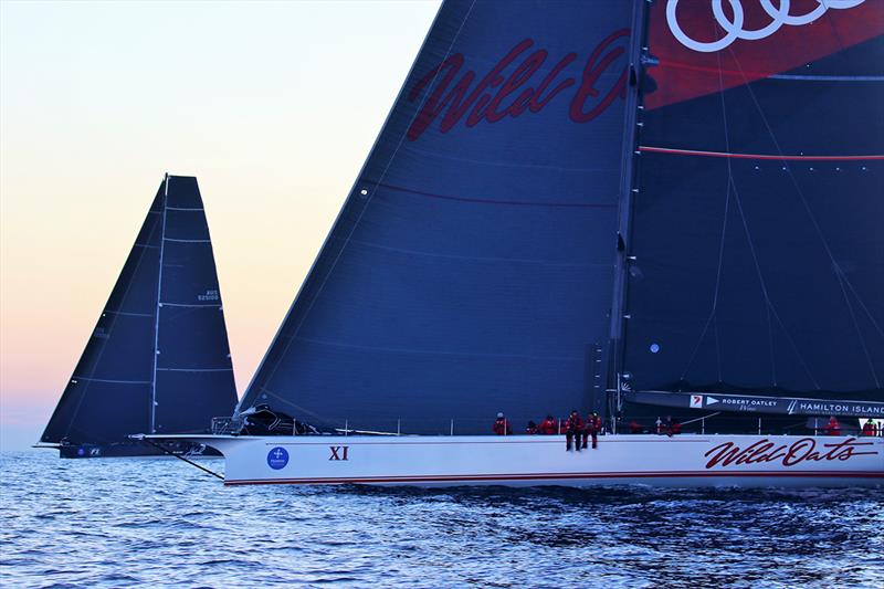 Black Jack and Wild Oats XI converge - 2018 Noakes Sydney Gold Coast Yacht Race photo copyright Nic Douglass taken at Cruising Yacht Club of Australia and featuring the Maxi class