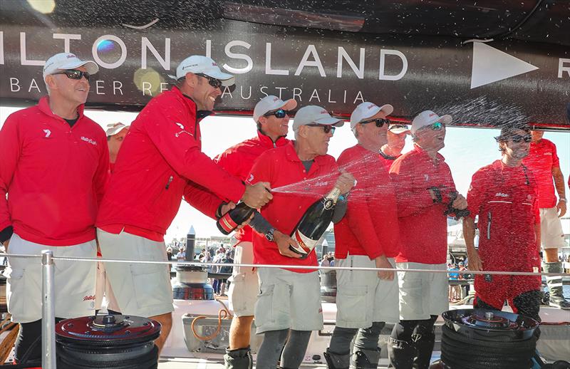 The champagne flows aboard Wild Oats XI photo copyright Crosbie Lorimer taken at Cruising Yacht Club of Australia and featuring the Maxi class