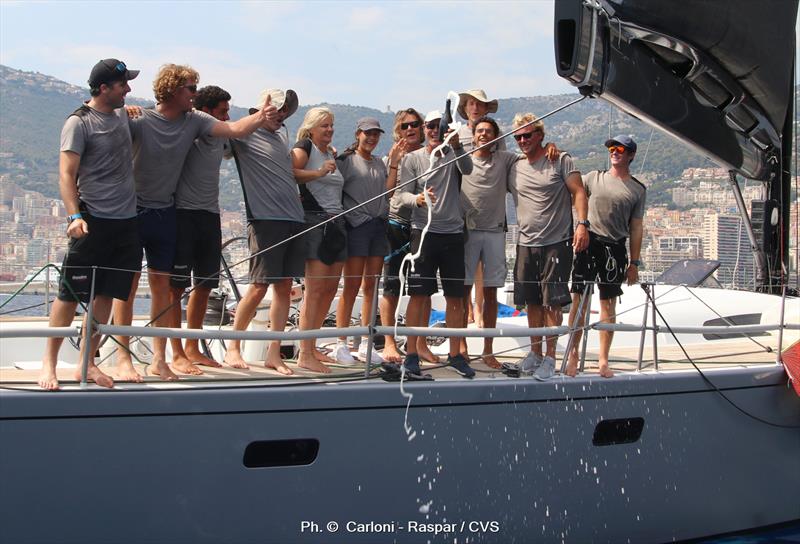 Celebrations on board Andreas Verder and Arco Van Nieuwland's Martin 72 Aragon photo copyright Carloni - Raspar / CVS taken at Yacht Club Costa Smeralda and featuring the Maxi class