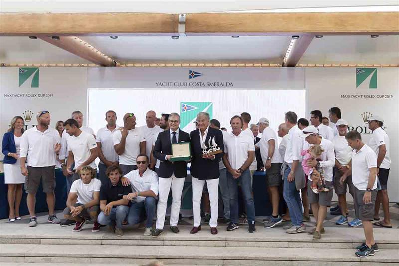 Ferrari and the Cannonball crew with their prizes including a Rolex timepiece. - photo © Studio Borlenghi / International Maxi Association