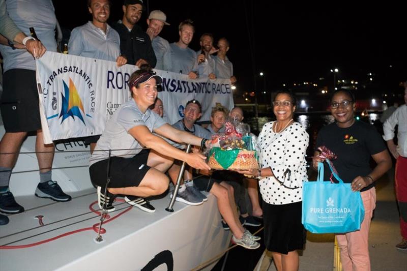 A fantastic welcome dockside in Grenada from Nikoyan Roberts on behalf of the Grenada Tourism Authority and Charlotte Bonin, Camper & Nicholsons Port Louis Marina Manager photo copyright RORC / Arthur Daniel taken at Royal Ocean Racing Club and featuring the Maxi class