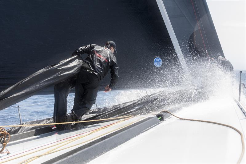 And as you can see from the sea state under the foot, this is a benign day. When hurtling along it would be more like a cold fire hose blasting you in the face, and trying to knock your feet out from under you! photo copyright Andrea Francolini taken at Cruising Yacht Club of Australia and featuring the Maxi class