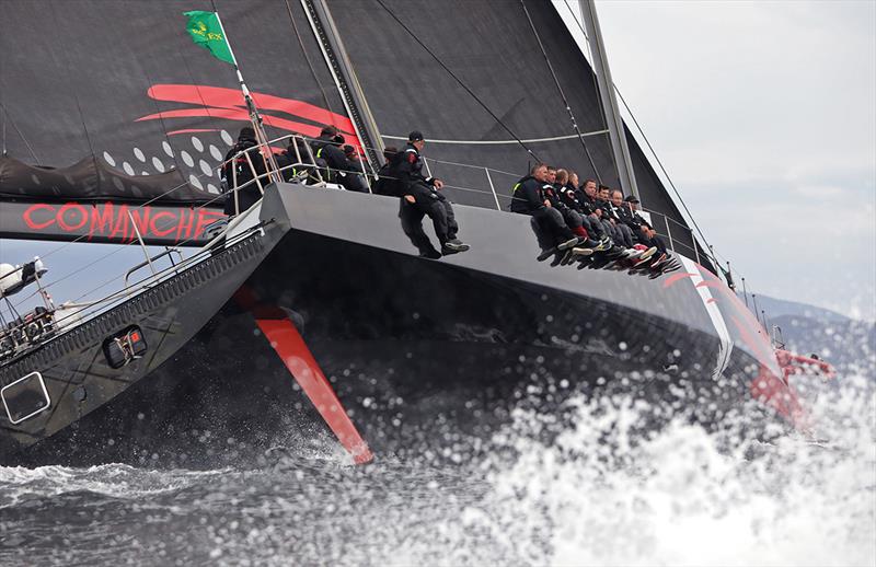 Comanche passes by as she flies up the Derwent River - photo © Crosbie Lorimer