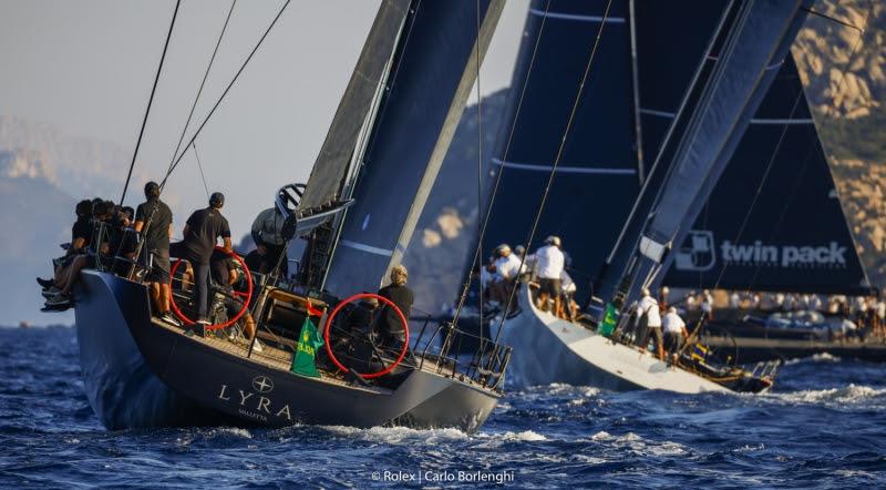 In the foreground the Wally Lyra, leader of the provisional classification in the Mini Maxi 3 and 4 Division, Maxi Yacht Rolex Cup 2021 photo copyright Rolex / Carlo Borlenghi taken at Yacht Club Costa Smeralda and featuring the Maxi class