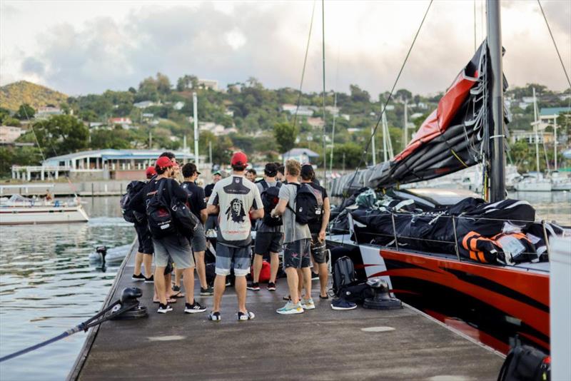 Comanche Team debrief dockside photo copyright Arthur Daniel / RORC taken at Royal Ocean Racing Club and featuring the Maxi class