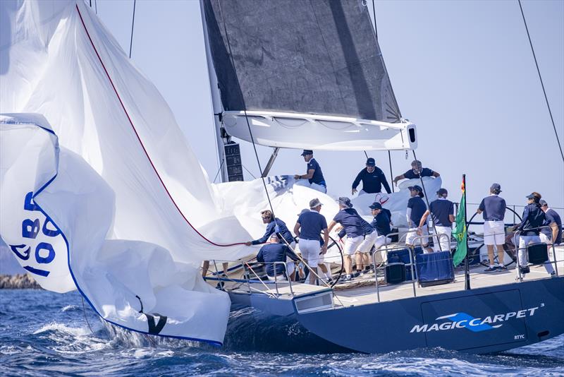 Massive sails require massive crew work on board Magic Carpet Cubed - photo © IMA / Studio Borlenghi