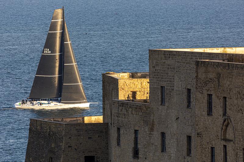Alessandro del Bono's Capricorno sets sail from off Naples' historic Castel dell'Ovo. - 2022 IMA Maxi European Championship - photo © ROLEX / Studio Borlenghi