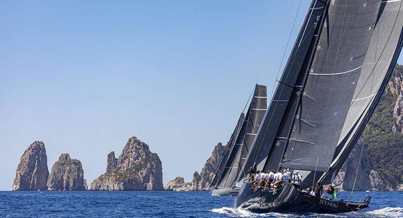 Highland Fling XI and Jethou approach the Faraglioni - IMA Maxi European Championship photo copyright ROLEX / Studio Borlenghi taken at Circolo del Remo e della Vela Italia and featuring the Maxi class