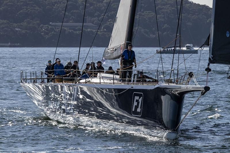 Black Jack had a confab in Taylors Bay, then hoisted the main, came gliding over, and lead the fleet out the Heads photo copyright John Curnow taken at Cruising Yacht Club of Australia and featuring the Maxi class