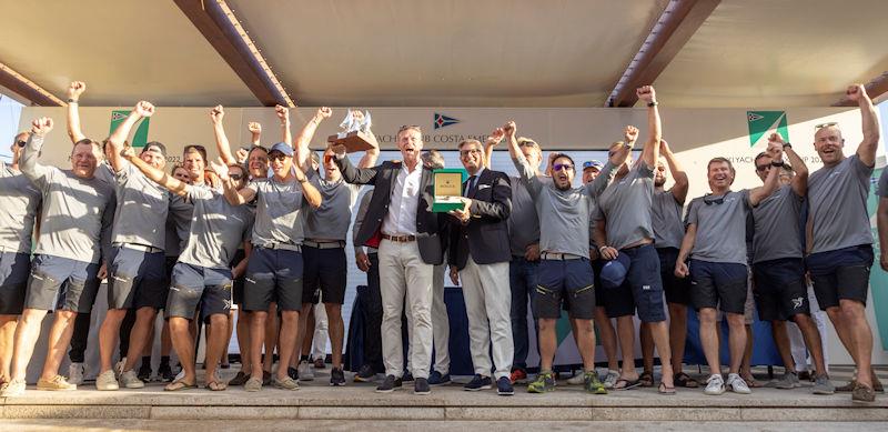 The crew of Shamanna collect their prizes for winning the Super Maxi class at the Maxi Yacht Rolex Cup 2022 - photo © IMA / Studio Borlenghi