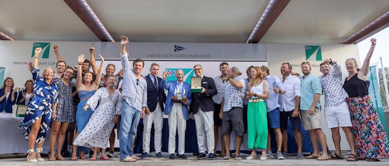Lord Irvine Laidlaw and his team receive their prizes at the Maxi Yacht Rolex Cup 2022 photo copyright IMA / Studio Borlenghi taken at Yacht Club Costa Smeralda and featuring the Maxi class