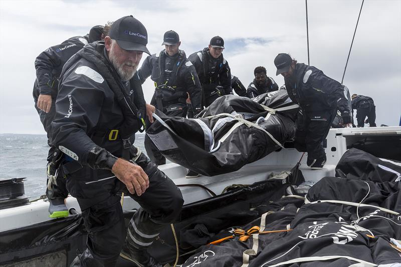 Sail Management for LawConnect now includes sending the heavy sails down below - photo © Andrea Francolini