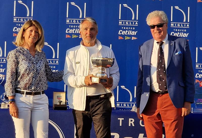 Elena and Aldo Parisotto receive the Gianfranco Alberini Trophy from IMA Secretary General Andrew McIrvine for IRC maxi class victory in this year's 151 Miglia-Trofeo Cetilar photo copyright James Boyd / IMA taken at Yacht Club Punta Ala and featuring the Maxi class