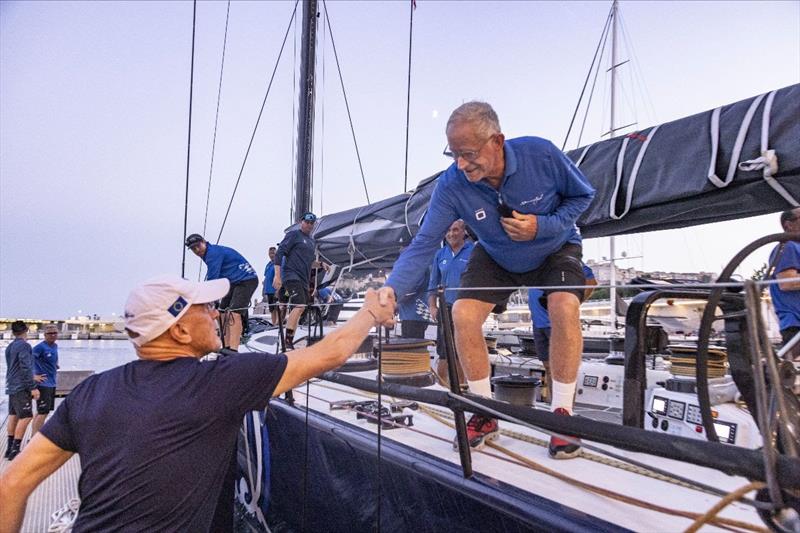 Black Jack owner Peter Harburg shakes hands with Igor Simcic, who owned his boat when she was Esimit Europa II (and set the Palermo-Montecarlo race record) photo copyright Circolo della Vela Sicilia / Studio Borlenghi taken at Circolo della Vela Sicilia and featuring the Maxi class