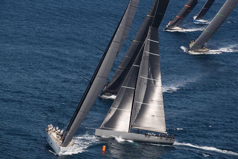 Peter Duben's North Star squeezes into the top mark on port just astern of Chris Flowers' 100ft Galateia - Les Voiles de Saint-Tropez 2023 Day 3 photo copyright Gilles Martin-Raget taken at Société Nautique de Saint-Tropez and featuring the Maxi class