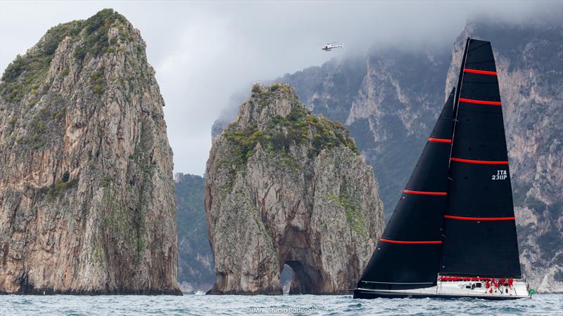 Pier Luigi Loro Piana's ClubSwan 80 My Song passes Capri's famous Faraglioni Rocks photo copyright IMA / Studio Borlenghi taken at Circolo del Remo e della Vela Italia and featuring the Maxi class