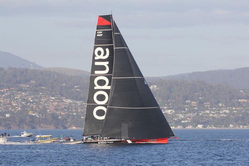 andoo Comanche climbs up the River Derwent photo copyright Tony Lathouras taken at Royal Yacht Club of Tasmania and featuring the Maxi class
