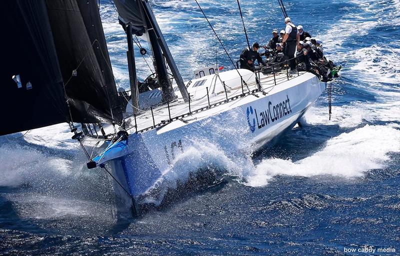 LawConnect powers along photo copyright Bow Caddy Media taken at Cruising Yacht Club of Australia and featuring the Maxi class