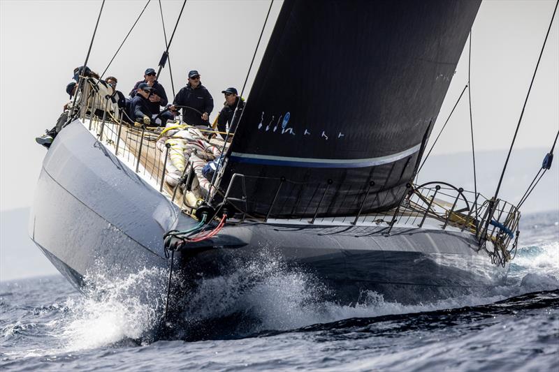 Giant bow on Sir Lindsay Owen-Jones' new canting raking keeled Magic Carpet E - photo © SailingShots by Maria Muiña