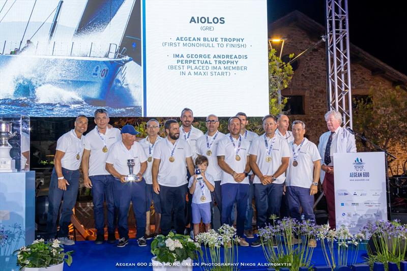 Aiolos' George Procopiou was presented with the George Andreadis Challenge Trophy by the IMA Secretary General Andrew McIrvine photo copyright Nikos Alevromytis / Alen Photography taken at Hellenic Offshore Racing Club and featuring the Maxi class