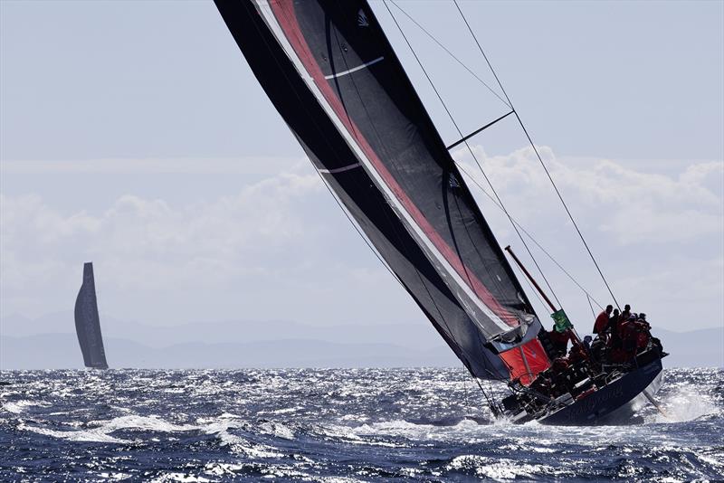 SHK Scallywag 100 rounding Tasman Island photo copyright Rolex / Andrea Francolini taken at Cruising Yacht Club of Australia and featuring the Maxi class