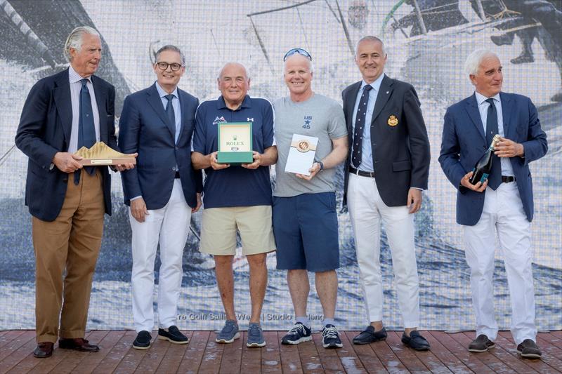 Hap Fauth and Terry Hutchinson receive the winners' prizes for the 2025 IMA Maxi European Championship photo copyright IMA / Studio Borlenghi  taken at Circolo del Remo e della Vela Italia and featuring the Maxi class
