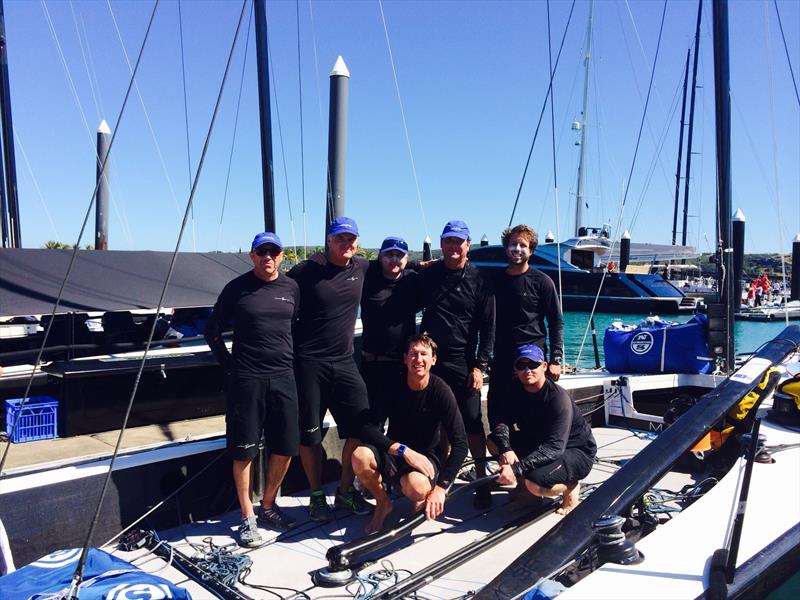 Second placed John Bacon (left) and his Dark Star crew at Audi Hamilton Island Race Week photo copyright Ellen Pragnell-Raasch taken at Royal Hamilton Yacht Club and featuring the MC38 class