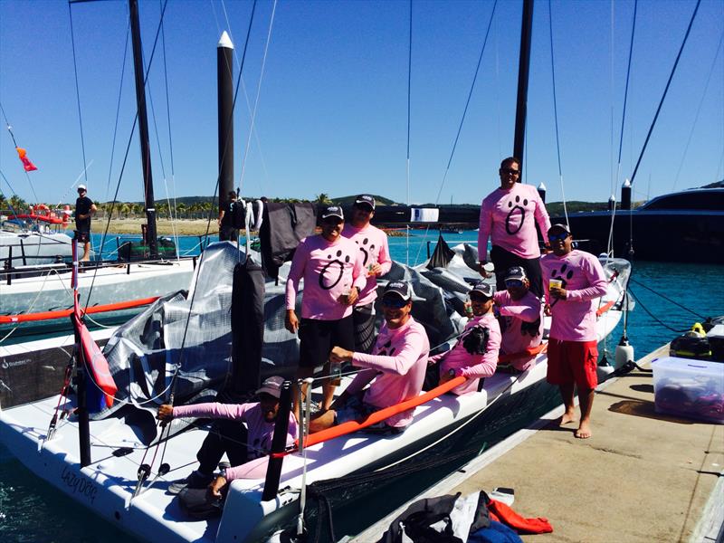 Sergio Sagromoso's Lazy Dog crew celebrating their first MC38 regatta at Audi Hamilton Island Race Week photo copyright Ellen Pragnell-Raasch taken at Royal Hamilton Yacht Club and featuring the MC38 class