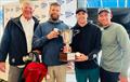 Brian Porter at the helm of Full Throttle won his 9th U.S. Melges 24 National Championship on Pensacola Bay in Florida. From left to right: Brian Porter, Bri Porter, RJ Porter and Matt Woodworth © Joy Dunigan