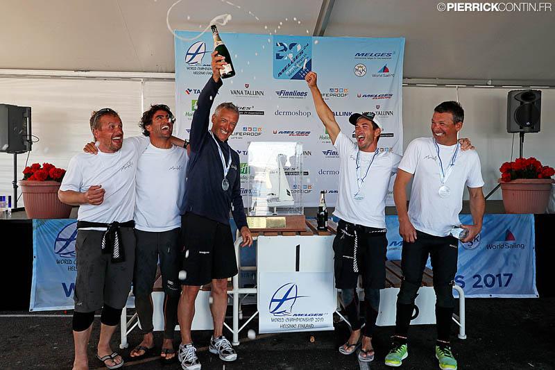 The happy team of Maidollis celebrating their victory at the Melges 24 Worlds in Heksinki photo copyright Pierrick Contin / www.pierrickcontin.com taken at Helsingfors Segelklubb and featuring the Melges 24 class